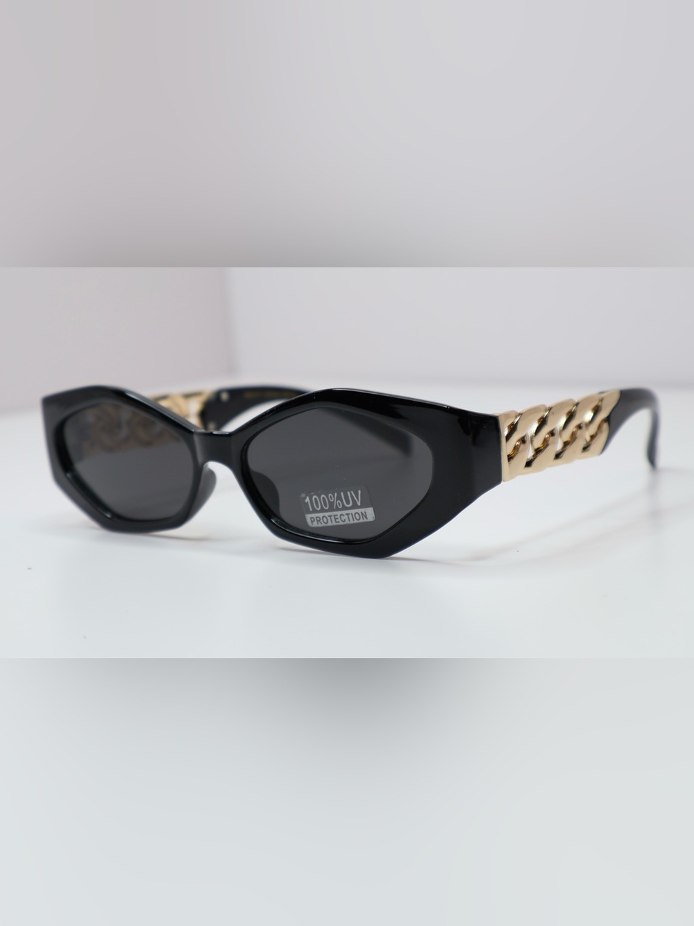 Women’s Black Cat-Eye Sunglasses with Gold Chain Accent